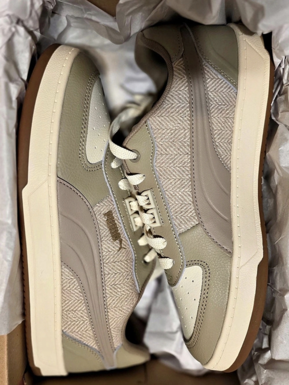 Puma Caven 2.0 Lux Sneakers In Alpine Snow/Ice Coffee/PUMA Gold colorway